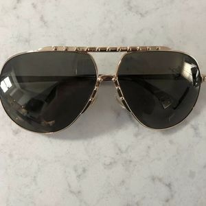 Jimmy Choo womens gold aviator sunglasses.